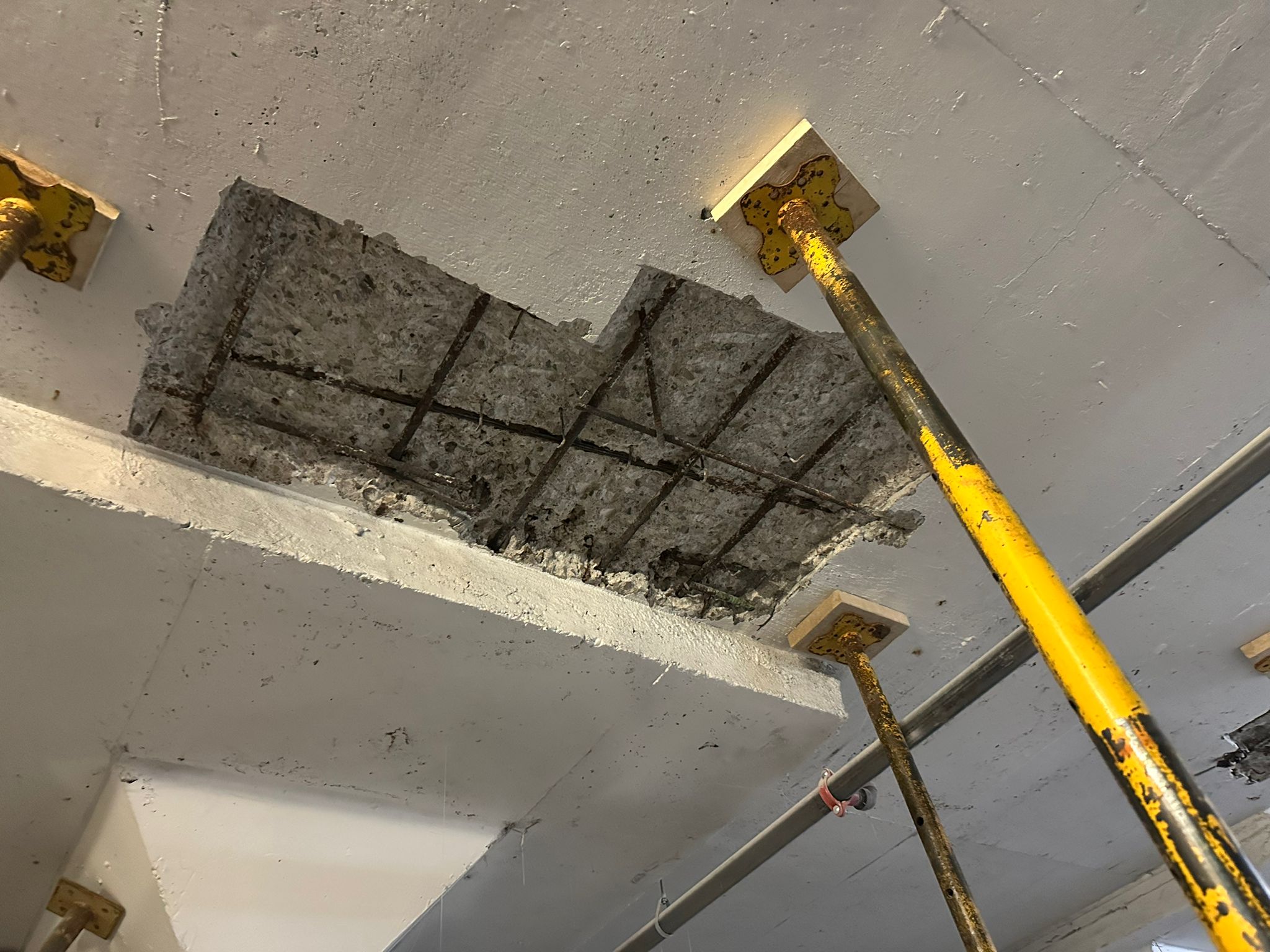Exposed reinforcing steel during concrete repair